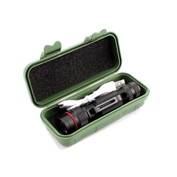 Flashlight stored in its green carry case