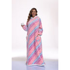 Pink star-print wearable blanket worn with the hood down