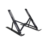 Black folding laptop stand opened to an angled position with gray contact pads