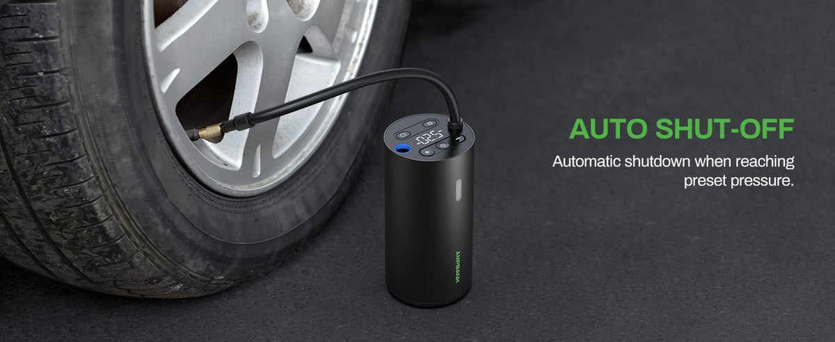 Tire inflator connected to a car tire valve; it stops automatically at the preset pressure.