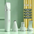 Mint pet grooming handle with an attached clipper head and three interchangeable heads