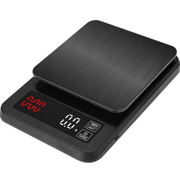 Black digital coffee scale showing separate timer and weight displays