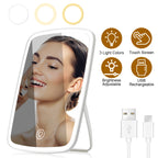 Mirror with its USB charging cable and icons for 3 light colors, touch control, adjustable brightness and USB charging