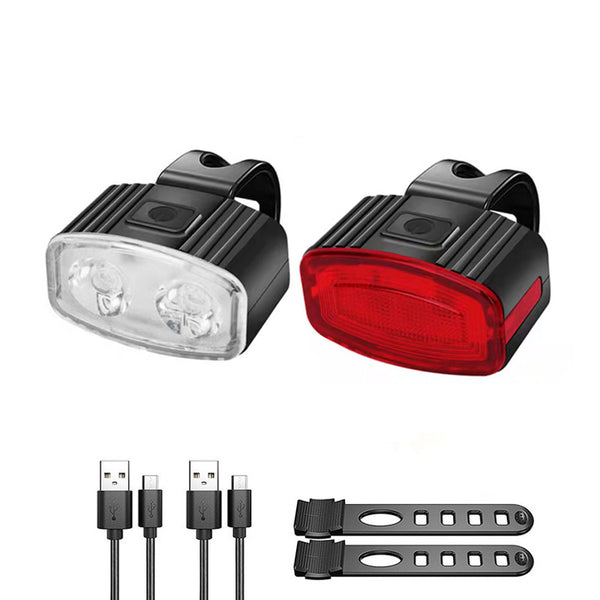 White front and red rear bike lights with two USB cables and mounting straps
