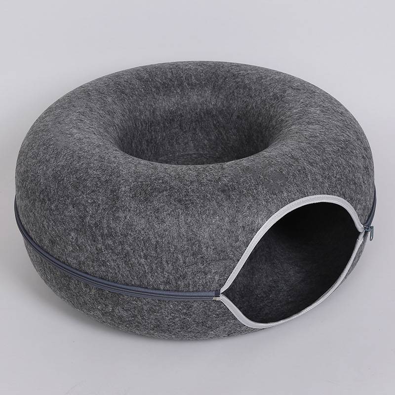 Dark grey felt tunnel bed with its zip-edged opening