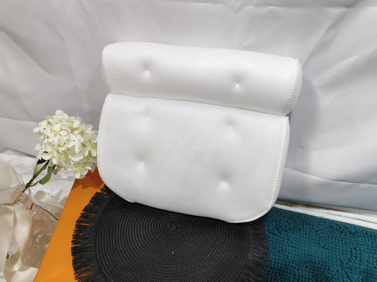 Bath pillow standing on a bath mat